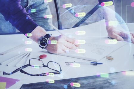 Writing man with technology icons. . Double exposure. Network and data concept.の写真素材