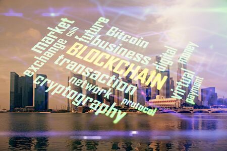 Multi exposure of cryptocurrency theme hologram drawing and city veiw background. Concept of blockchain and bitcoin.の写真素材