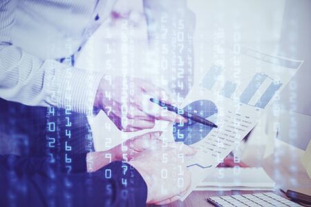 Writing mans hand with technology Ai icons.の写真素材