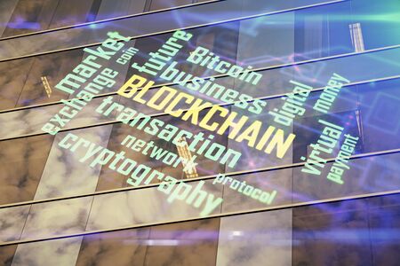 Multi exposure of cryptocurrency theme hologram drawing and city veiw background. Concept of...