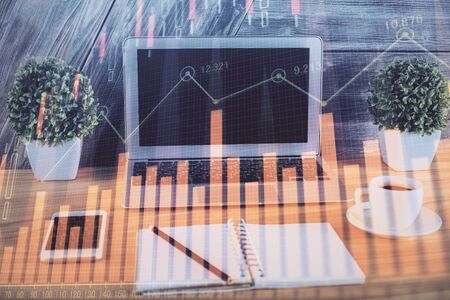 Multi exposure of forex graph and work space with computer. Concept of international online trading.の写真素材