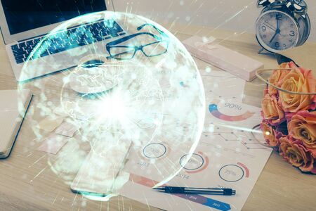 Double exposure of business theme icons and work space with computer background. Concept of success.の写真素材