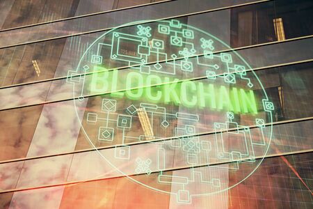 Multi exposure of cryptocurrency theme hologram drawing and city veiw background. Concept of...