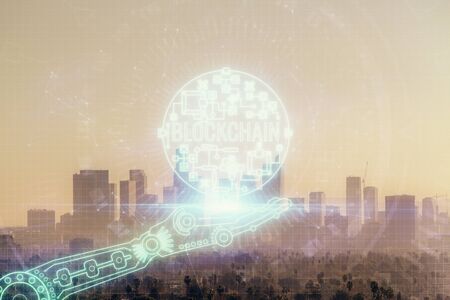 Double exposure of crypto currency theme hologram drawing and city veiw background. Concept of...