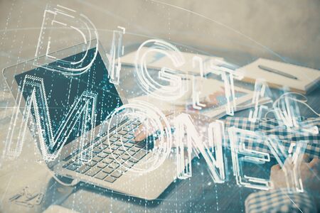 Blockchain theme hologram with man working on computer on background. Concept of crypto chain. Double exposure.の写真素材