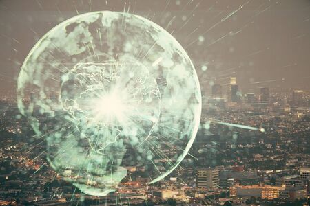 Double exposure of business theme hologram drawing and city veiw background. Concept of success.の写真素材