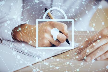 Human hands writing. With double exposure drawings.の写真素材