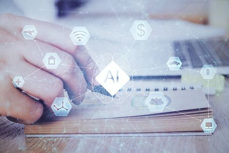 Writing human hands with data theme multi exposure icons.の写真素材