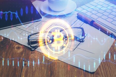 Crypto theme hologram with glasses on the table background. Concept of blockchain. Double exposure.の写真素材