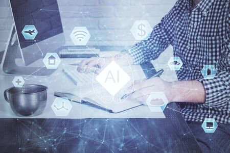 Businessman working on DeskTop with technology theme drawing. Concept of big data. Double exposure.の写真素材