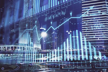 Financial chart on city scape with tall buildings background multi exposure. Analysis concept.の写真素材