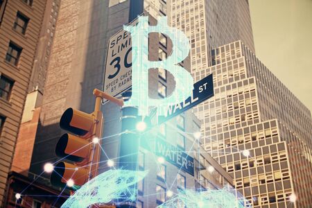 Double exposure of crypto currency theme hologram drawing and city veiw background. Concept of blockchain and bitcoin.の写真素材
