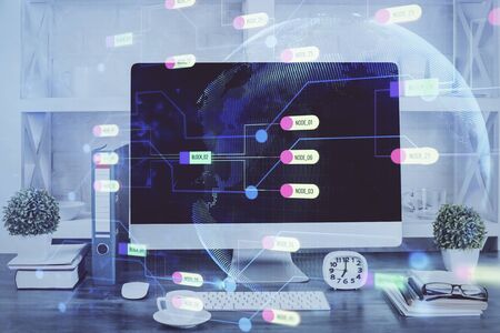 Double exposure of table with computer on background and data theme hologram. Data technology concept.の写真素材