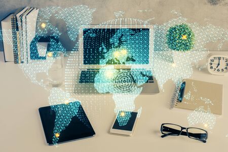 Double exposure of business theme icons and work space with computer background. Concept of success.の写真素材