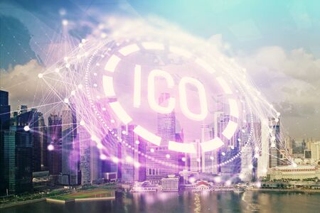 Double exposure of crypto currency theme hologram  and city view