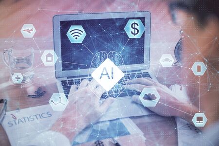 Businessman with computer background with technology theme hologram. Concept of big data. Double...
