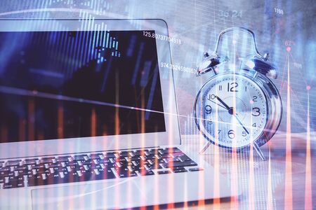 Forex market chart hologram and personal computer background. Multi exposure. Concept of investment.
