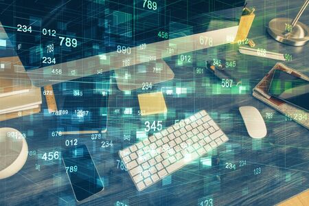 Technology theme drawing and table with computer. Double exposure. Concept of information.の写真素材