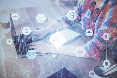 Businessman with computer background with technology theme hologram. Concept of big data. Double exposure.の写真素材