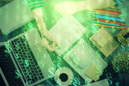 Financial chart drawn over hands taking notes background. Concept of research. Double exposureの写真素材