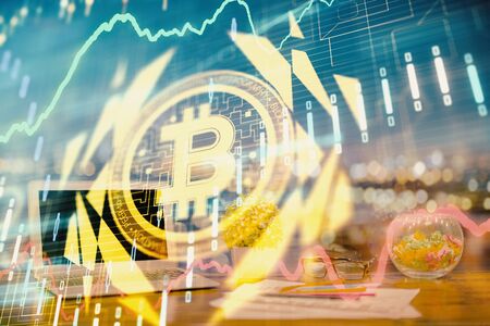 Double exposure of blockchain and crypto economy theme hologram and table with computer background. Concept of bitcoin cryptocurrency.の写真素材