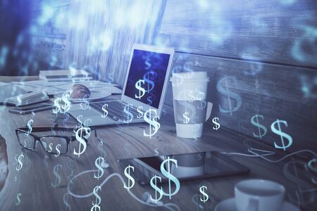 Stock market chart hologram drawn on personal computer background. Double exposure. Concept of investment.の写真素材
