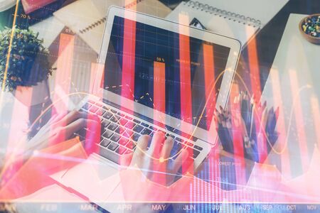 Double exposure hands with stock market chart. Concept of research and analysis.の写真素材