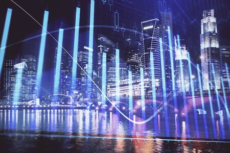 Financial chart on city scape with tall buildings background multi exposure. Analysis concept.の写真素材