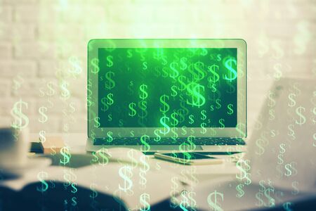 Stock market chart hologram drawn on personal computer background. Double exposure. Concept of investment.の写真素材