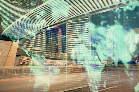 Double exposure of business theme hologram drawing and city veiw background. Concept of success.の写真素材