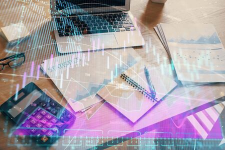 Multi exposure of forex chart and work space with computer. Concept of international online trading.の写真素材
