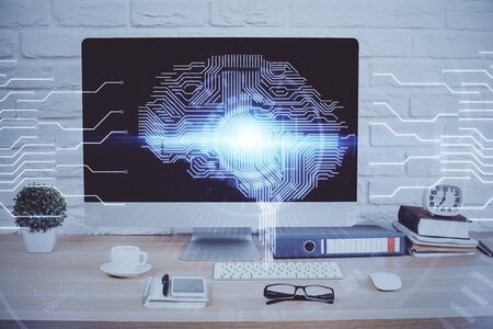 Double exposure of desktop with computer and brain drawing hologram. Artificial intelligence concept.の写真素材