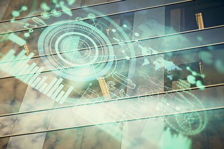 Double exposure of business theme hologram drawing and city veiw background. Concept of success.