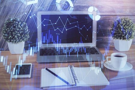 Multi exposure of forex chart and work space with computer. Concept of international online trading.の写真素材
