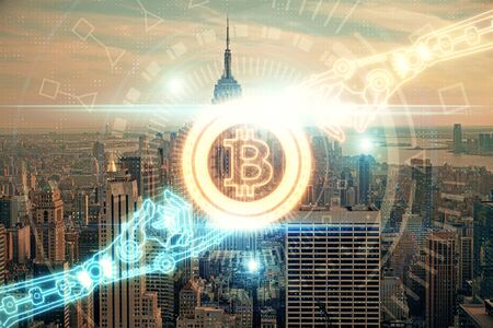 Double exposure of crypto currency theme hologram drawing and city veiw background. Concept of blockchain and bitcoin.の写真素材
