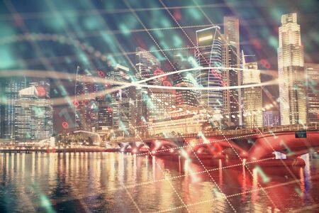 Financial chart on city scape with tall buildings background multi exposure. Analysis concept.の写真素材
