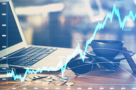 Multi exposure of forex graph and work space with computer. Concept of international online trading.の写真素材