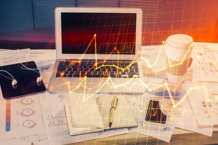 Multi exposure of forex chart and work space with computer. Concept of international online trading.の写真素材