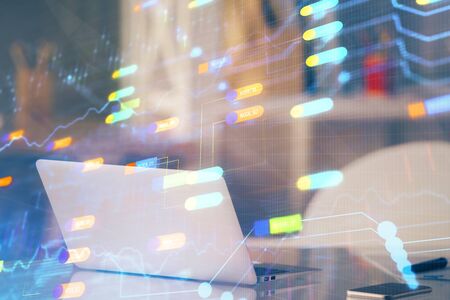 Technology theme drawing and table with computer. Double exposure. Concept of information.の写真素材