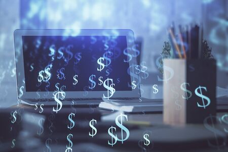 Forex graph hologram on table with computer background. Multi exposure. Concept of financial markets.の写真素材
