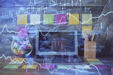 Multi exposure of forex graph and work space with computer. Concept of international online trading.の写真素材