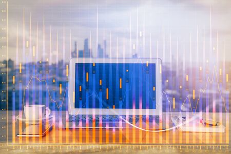 Stock market graph and table with computer background. Multi exposure. Concept of financial analysis.の写真素材