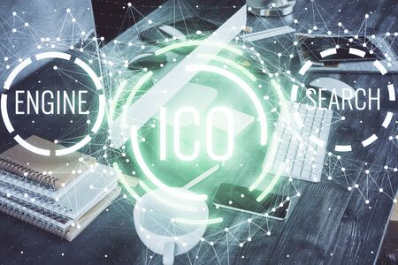 Double exposure of blockchain and crypto economy theme hologram and table with computer background. Concept of bitcoin cryptocurrency.の写真素材