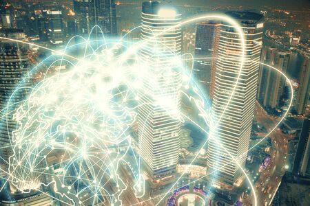 Double exposure of business theme hologram drawing and city veiw background. Concept of success.