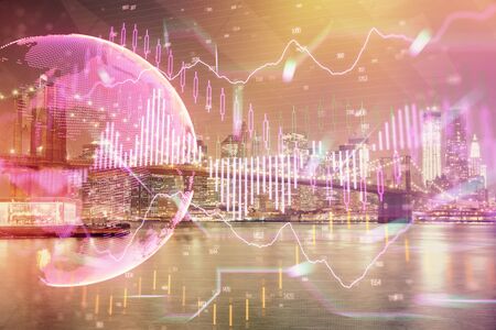 Financial chart on city scape with tall buildings background multi exposure. Analysis concept.の写真素材