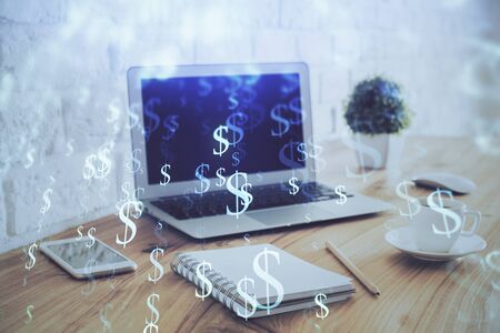 Stock market graph on background with desk and personal computer. Multi exposure. Concept of financial analysis.の写真素材