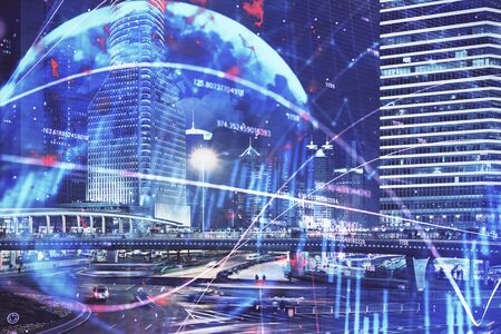 Financial chart on city scape with tall buildings background multi exposure. Analysis concept.の写真素材