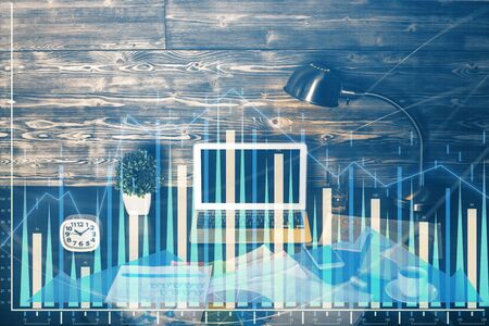 Double exposure of forex graph and work space with computer. Concept of international online trading.の写真素材