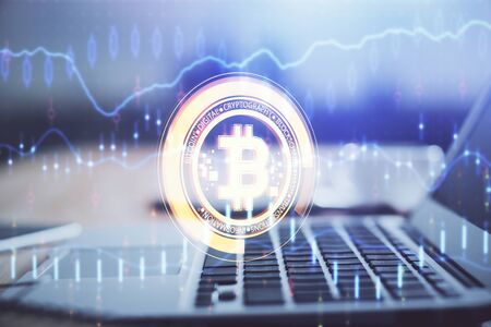 Multi exposure of blockchain theme hologram and table with computer background. Concept of bitcoin...