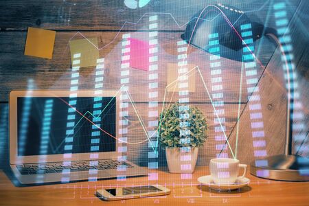 Multi exposure of chart and financial info and work space with computer background. Concept of international online trading.の写真素材